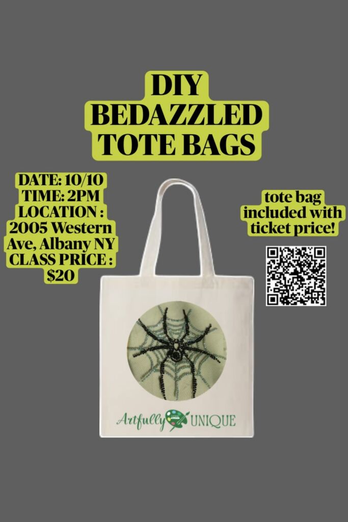 Flyer for "DIY Bedazzled Tote Bags" presented by Artfully Unique on a solid gray backdrop. Prominently features a white canvas tote bag displaying a bedazzled spiderweb design in the center. Text blocks detail: Date 10/10, Time 2 PM, Location 2005 Western Ave, Albany NY, Class Price $20, and "tote bag included with ticket price!" next to a QR code for registration.